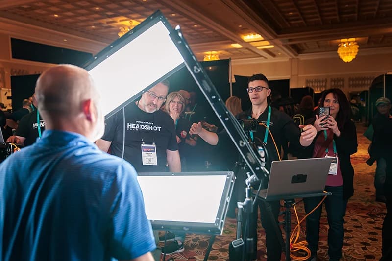 Behind the scenes at a professional headshot lounge setup at Pittsburgh conference