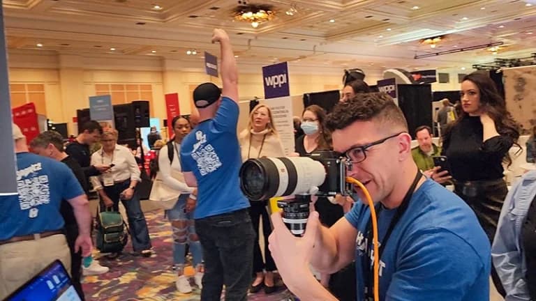 Chad Isaiah Studios team running high-volume headshot lounge at conference event