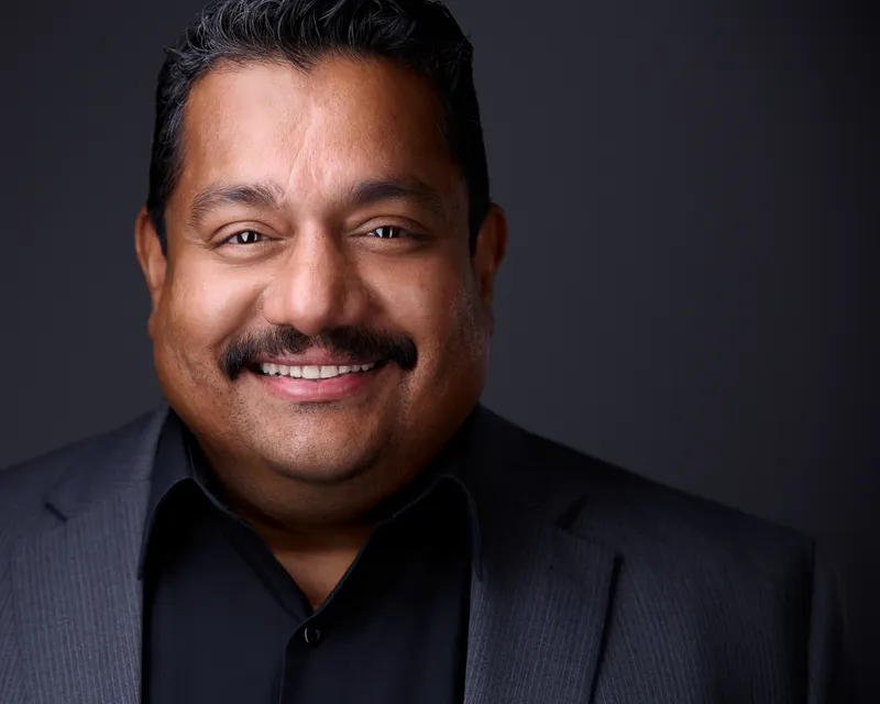 Headshot for men with a classic button-up shirt