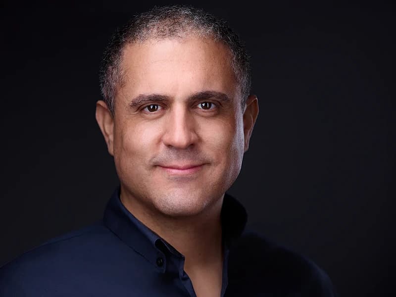 Professional headshot without tie - modern approachable look