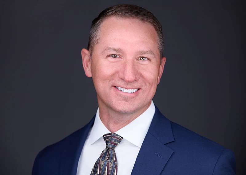 Professional headshot with tie - traditional professional look