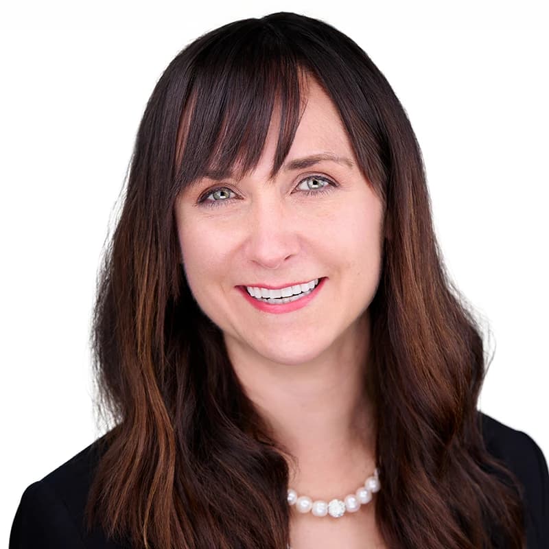 Professional headshot wearing Black