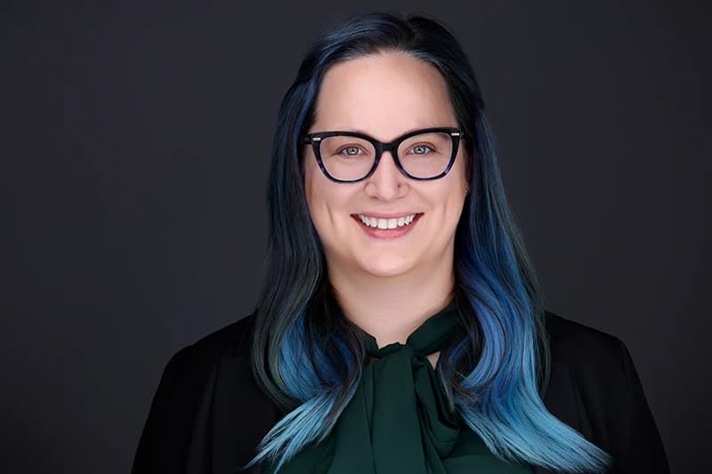Female therapist headshot session showing warm, natural expression coaching - Chad Isaiah Studios Pittsburgh