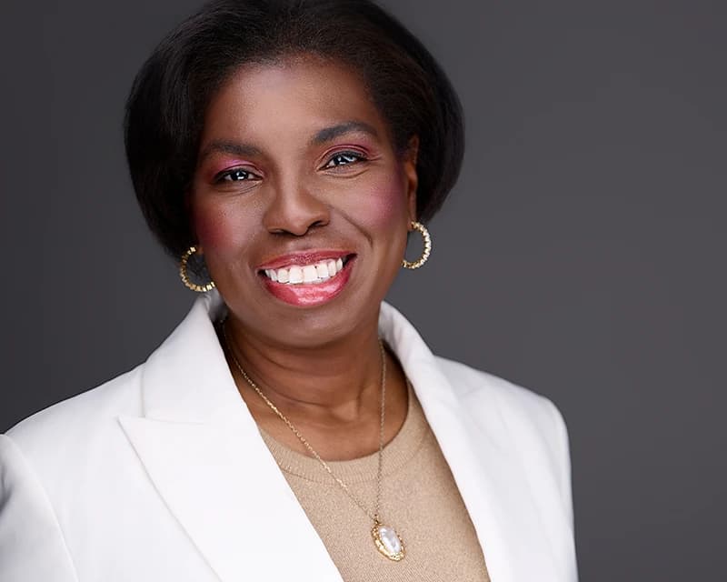 Professional headshot of Maria Lewis, Washington-area client