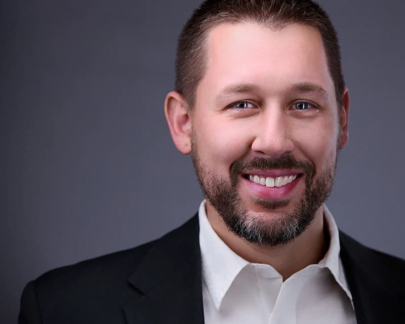 Headshot poses for men with a well-groomed beard