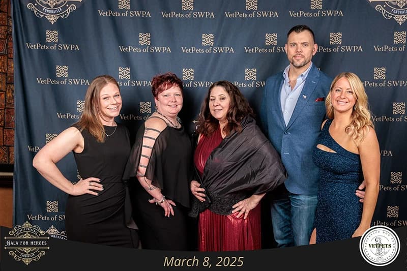 VetPets nonprofit gala guests at custom branded step and repeat backdrop