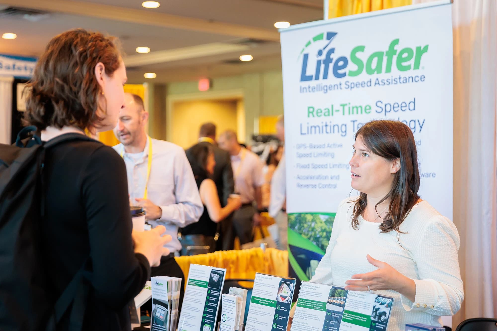 Trade show booth with attendee interaction