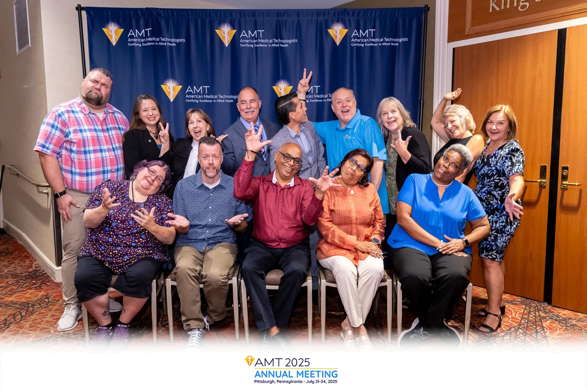 Fun step and repeat photography experience with excited attendees